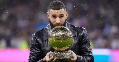 French striker Karim Benzema holding Ballon d'Or trophy
